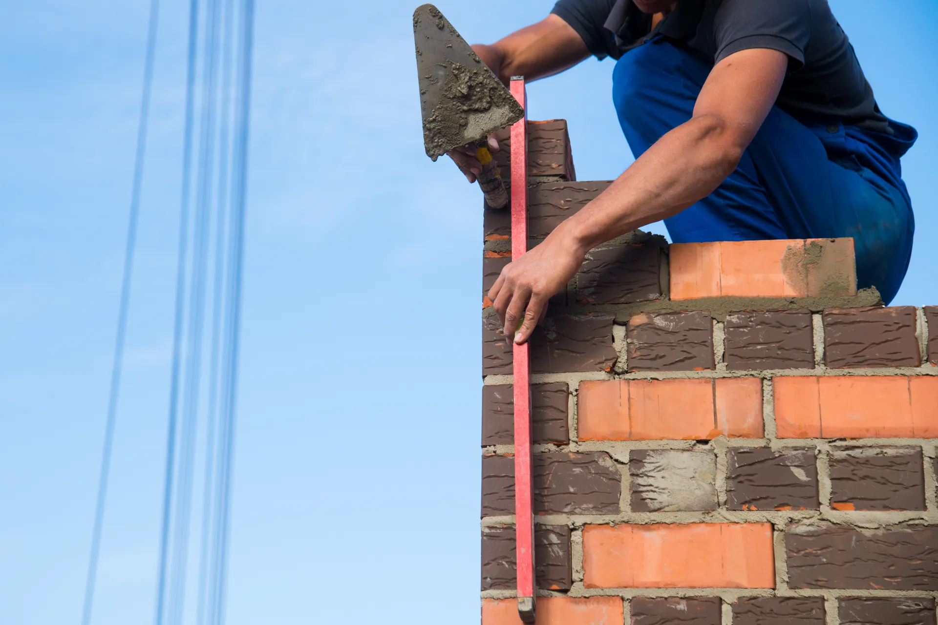 Chimney Crown vs. Chimney Cap: What’s the Difference?
